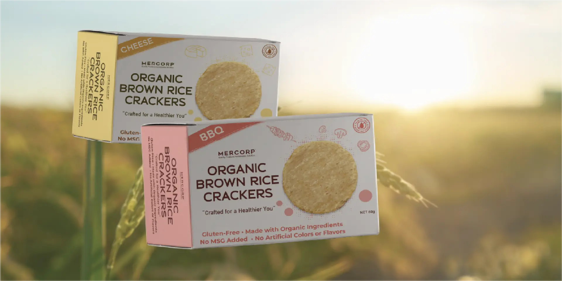 mercorp organic brown rice crackers assorted flavors on natural rice field background