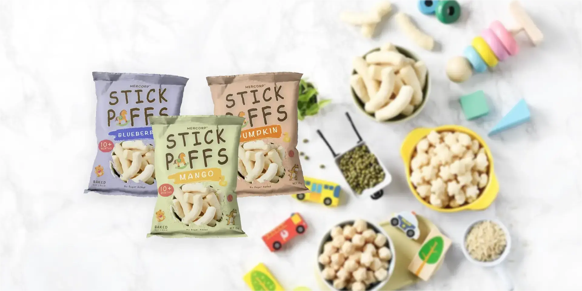 mercorp stick puffs assorted flavors rice snack on clean background with playful